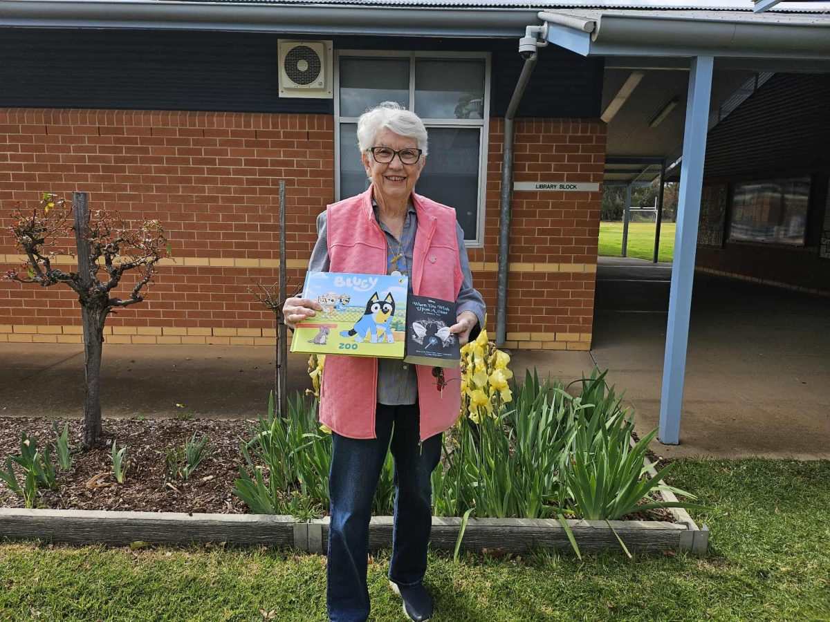 senior woman with books