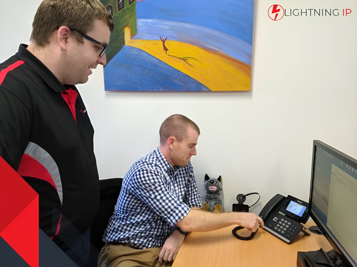 Two guys on computer