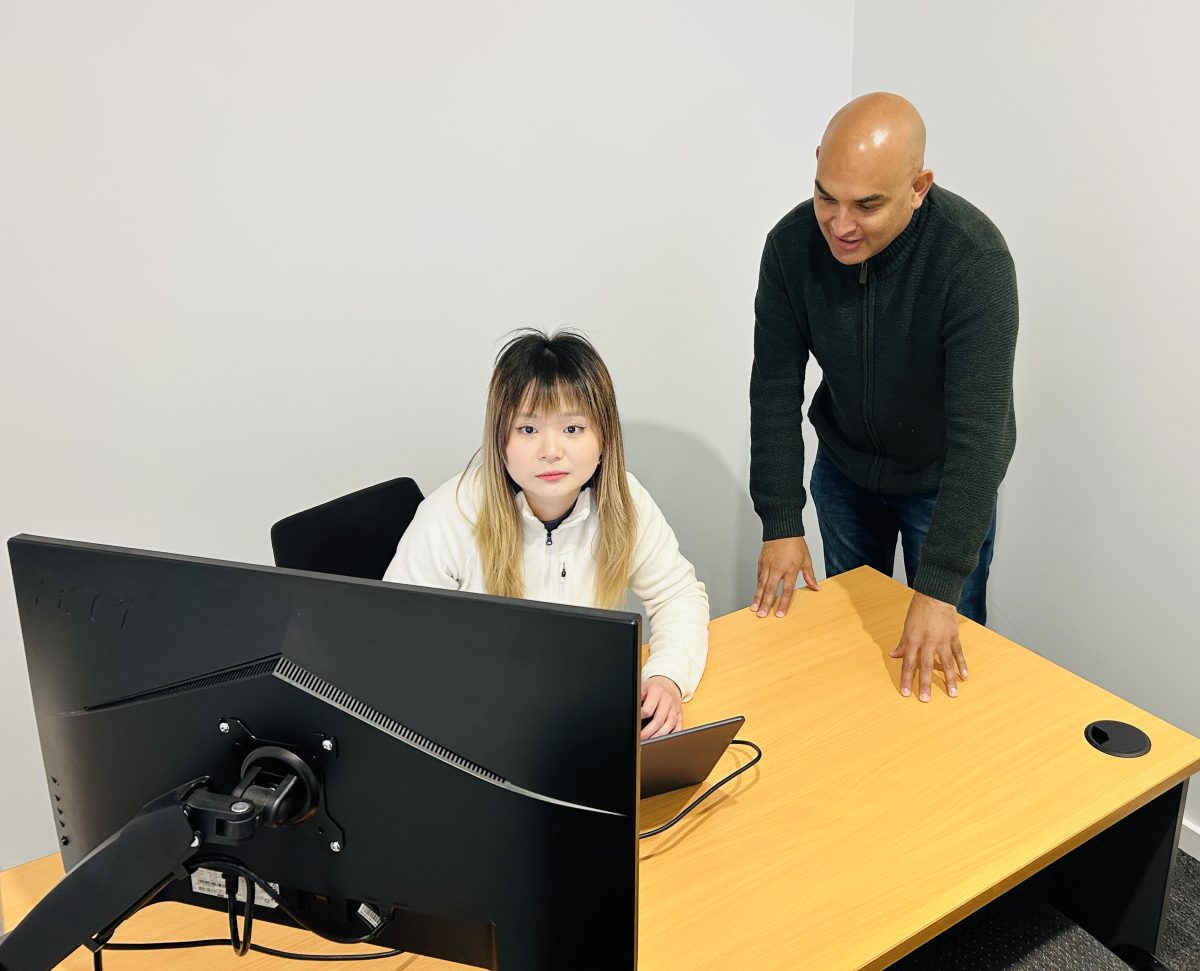 Erin and Oliver at work
