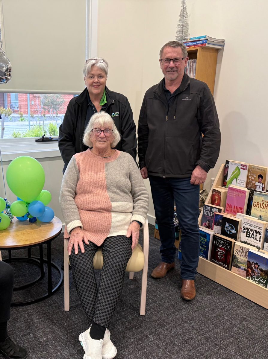 "I love it here." Pinaroo Village resident Joy Cox, with Opening Doors Foundation management Lee Hesketh and CEO Shane McMullen. Picture: Marguerite McKinnon