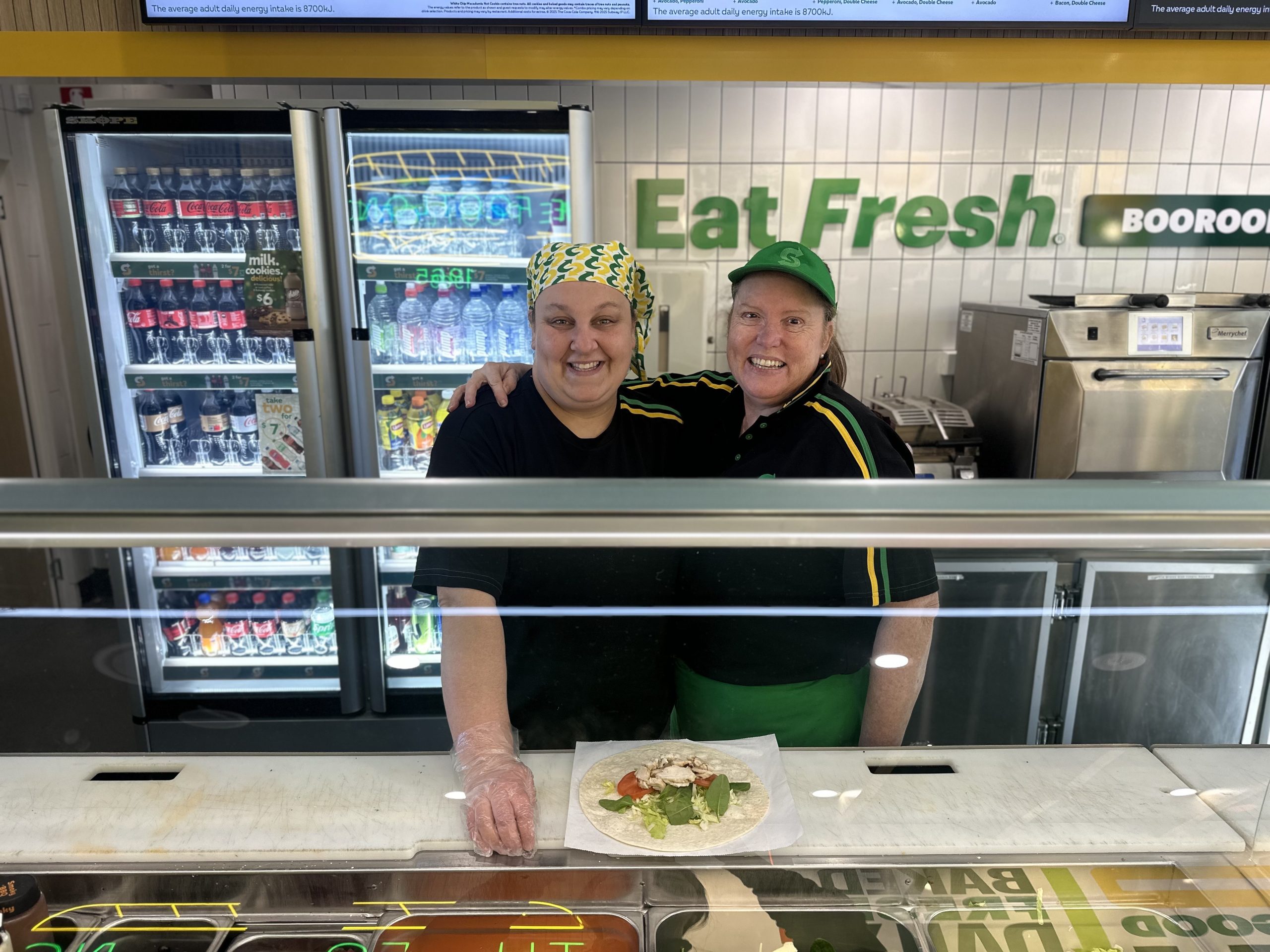 Chloe Lee and Leanne Grace behind the counter.