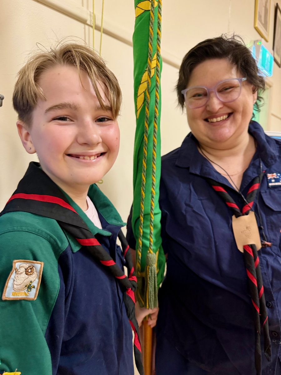 smiling boy and smiling woman who are Scouts