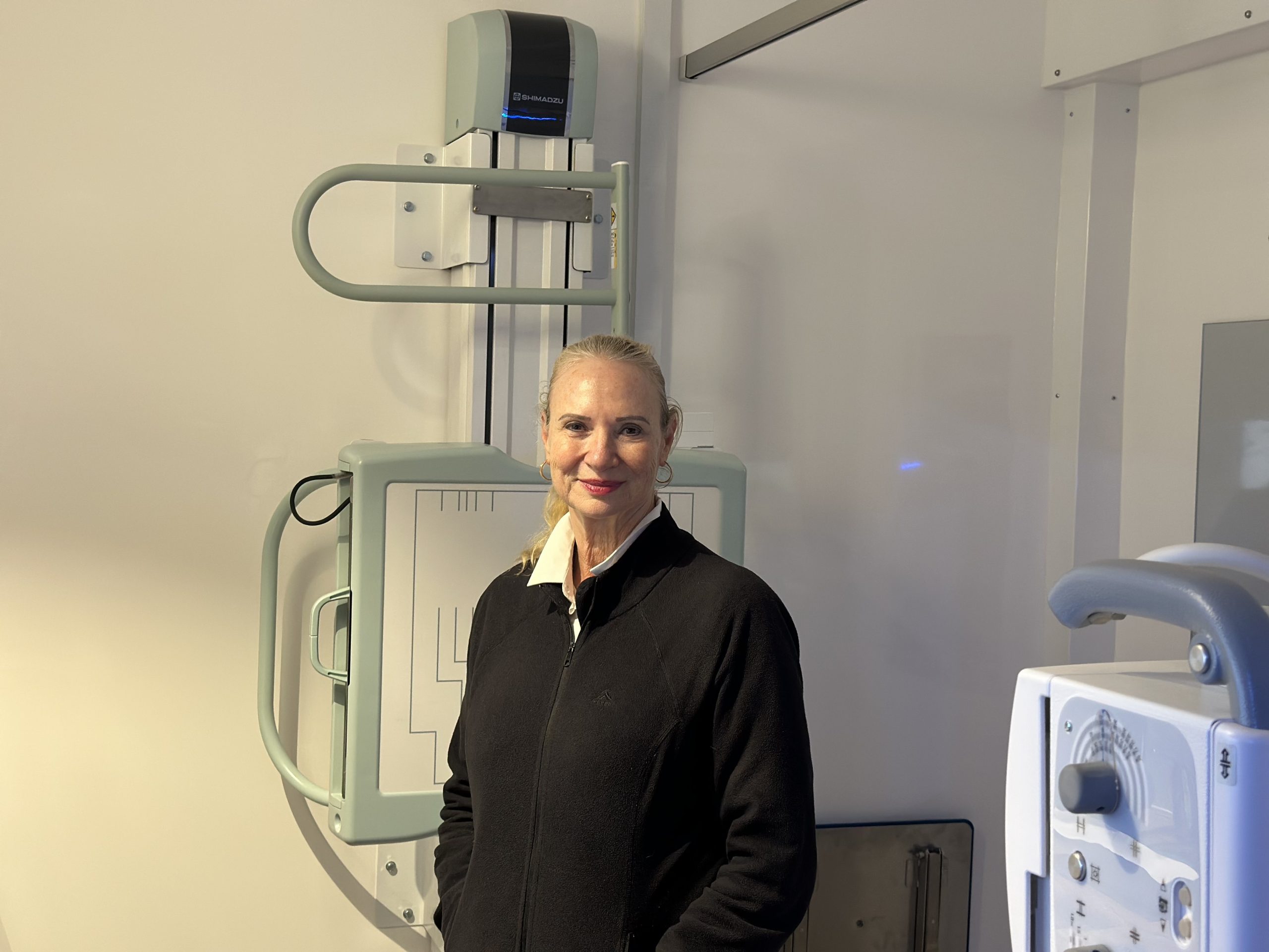 woman and radiography equipment