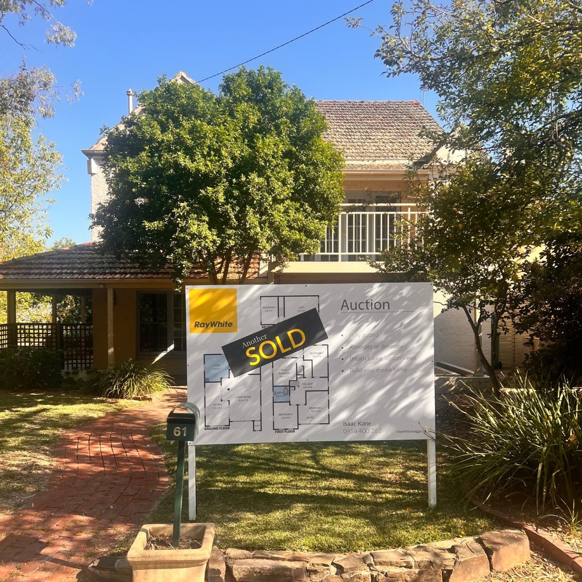 sold sign for house
