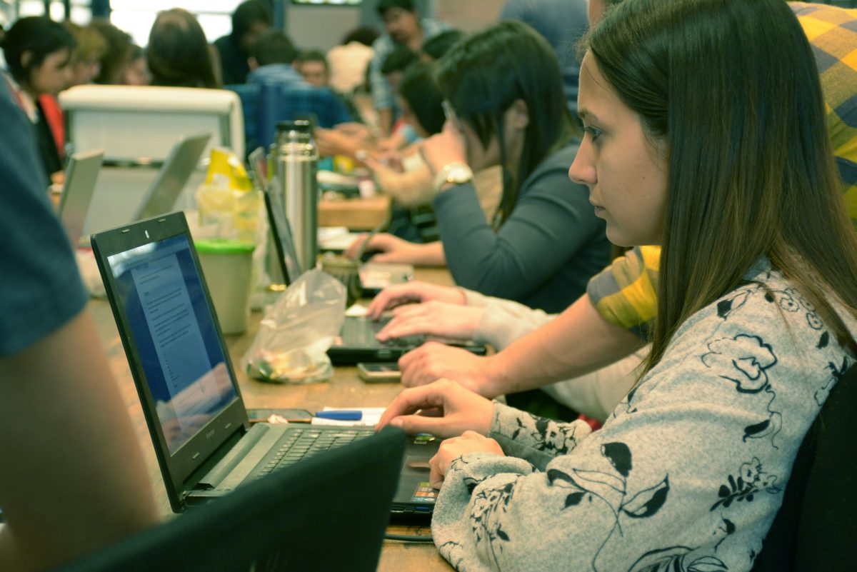 students using their laptops