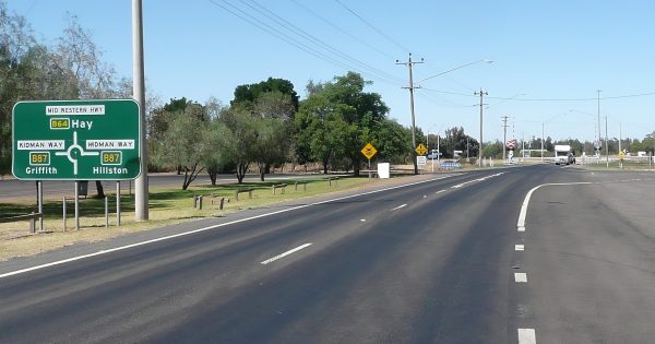 Unlicensed driver allegedly fell asleep before flipping unregistered Holden between Hay and Goolgowi