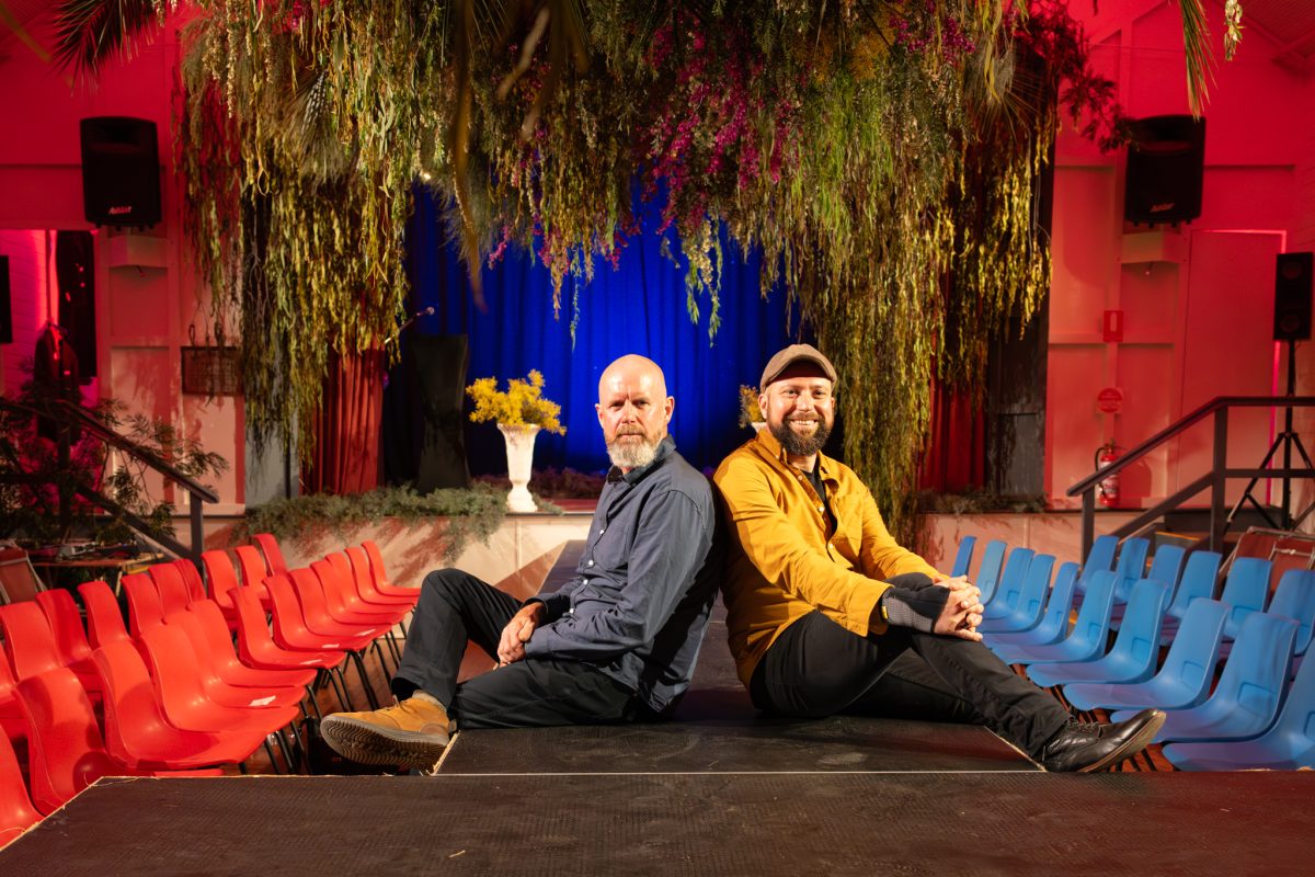 Jason Hickford and Pascal Proteau will transform the Balldale Recreation Hall into a work of wonder for this weekend's annual ball. They are pictured here in Burrumbuttock where they recently decorated its public hall for a vintage fashion show.