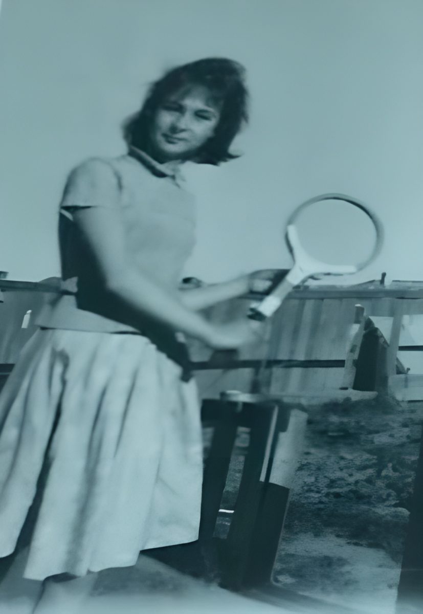 woman holding a tennis racquet