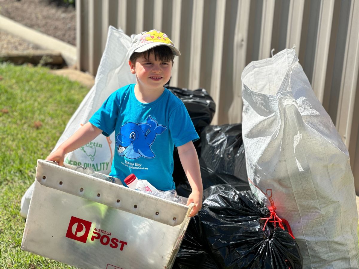 Little Ashton is hard at work collecting cans and bottles.