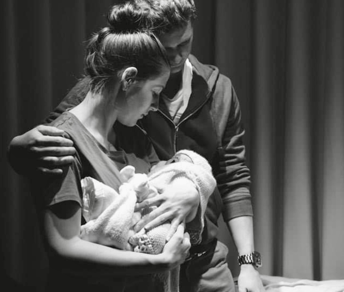 Bek and Matt from Wagga cradle their daughter Mia after she was stillborn at 35 weeks and 4 days.