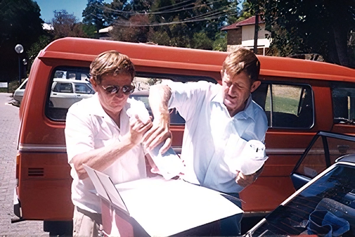 two men with engineering equipment