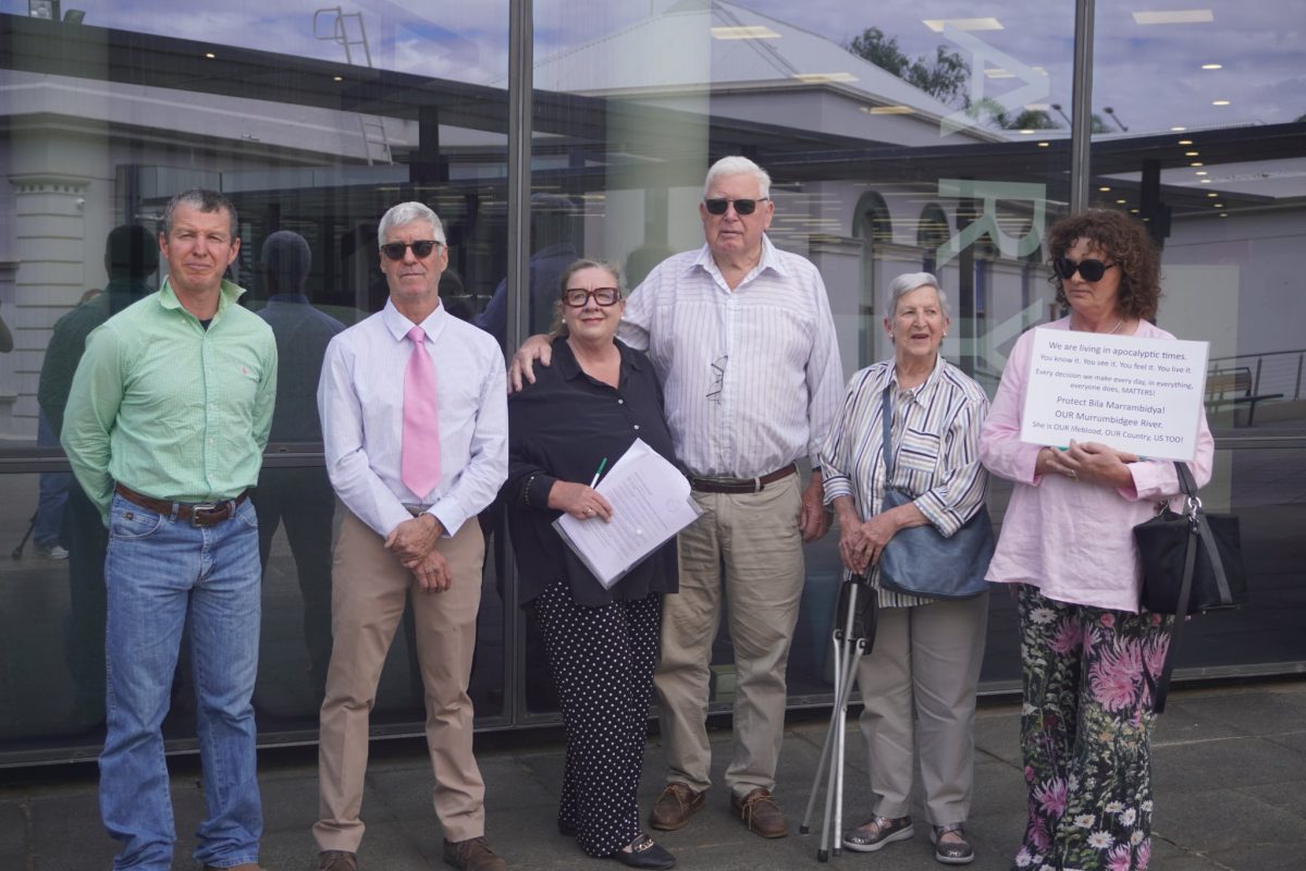 protest group members standing outside