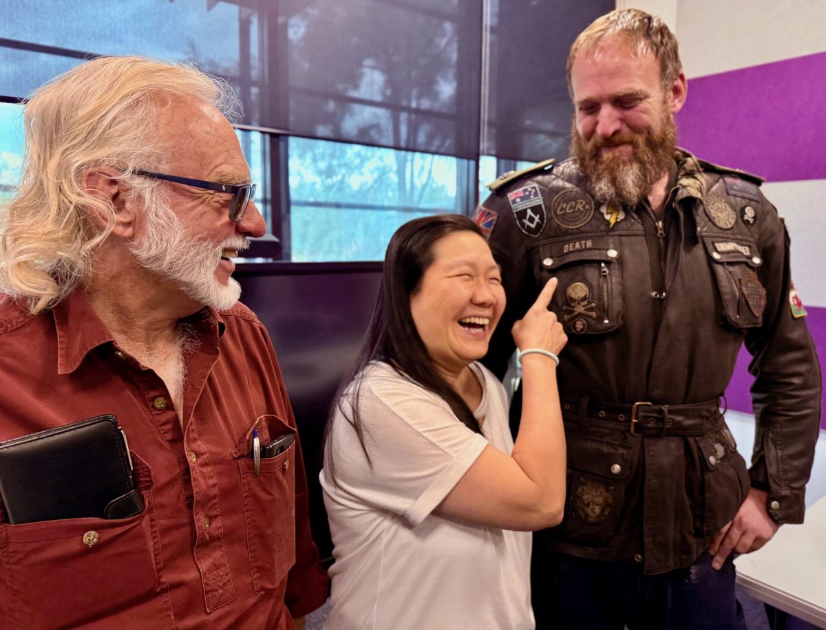 David's bike jacket's "Death" and "Unimpressed" embroidered patches caused some mirth at the Death Cafe at Wagga City Library. 