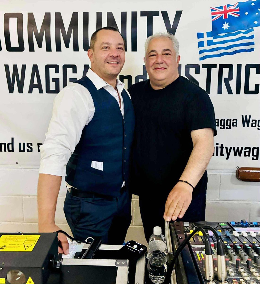 two men with DJ gear