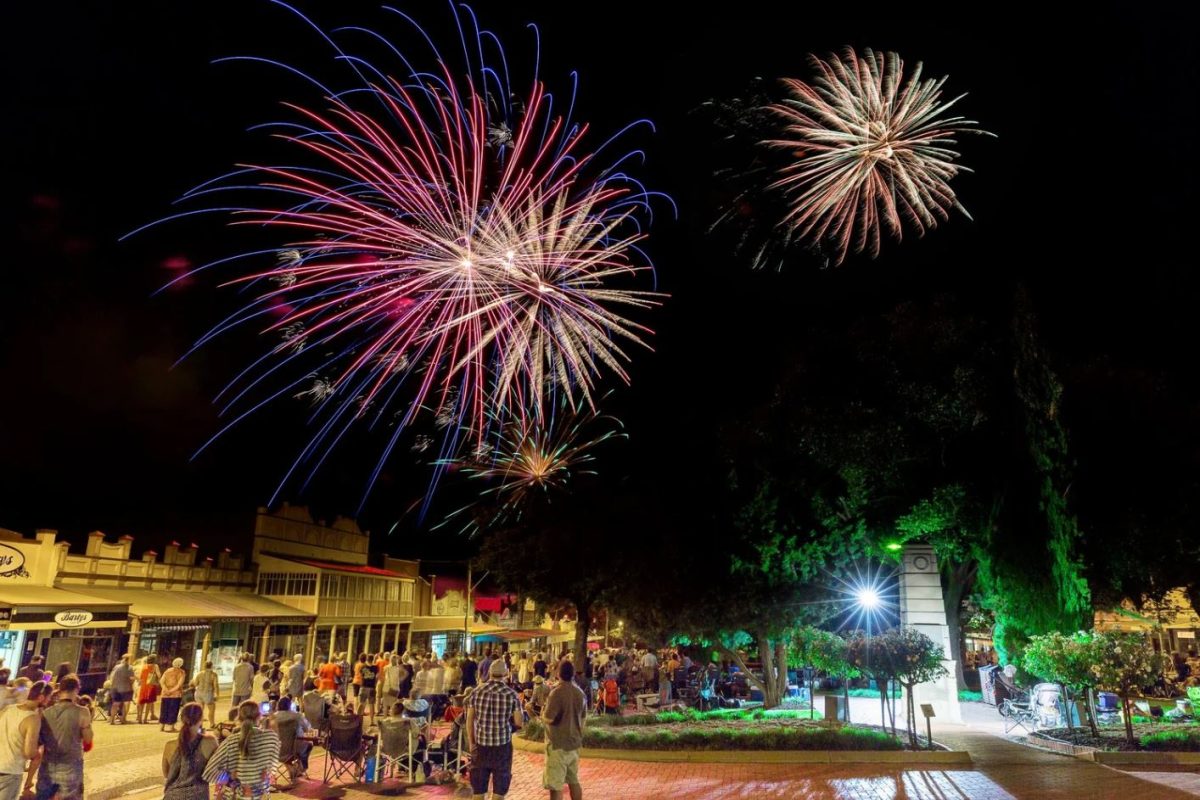 fireworks over a small-town street