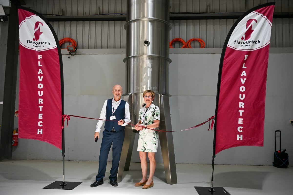 Politician cutting ribbon