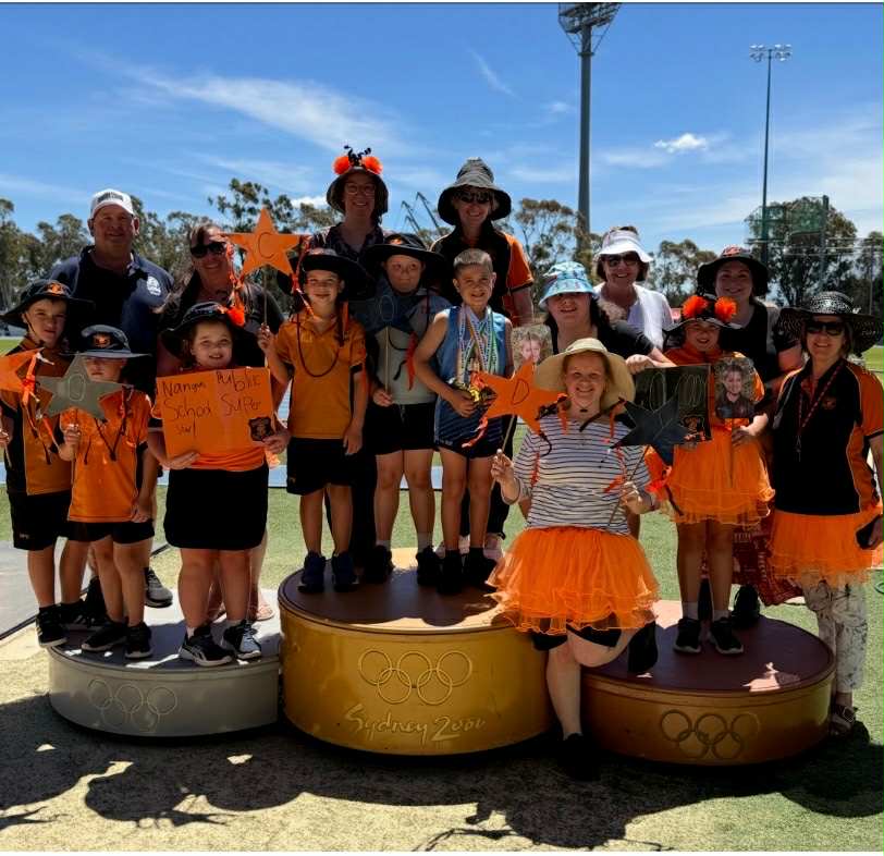 Dressed in school colour orange, all of Nangus Public School’s ten students, their teachers and staff made the trip to Canberra to watch Year 6 student Cody Wheeler become a national champion.