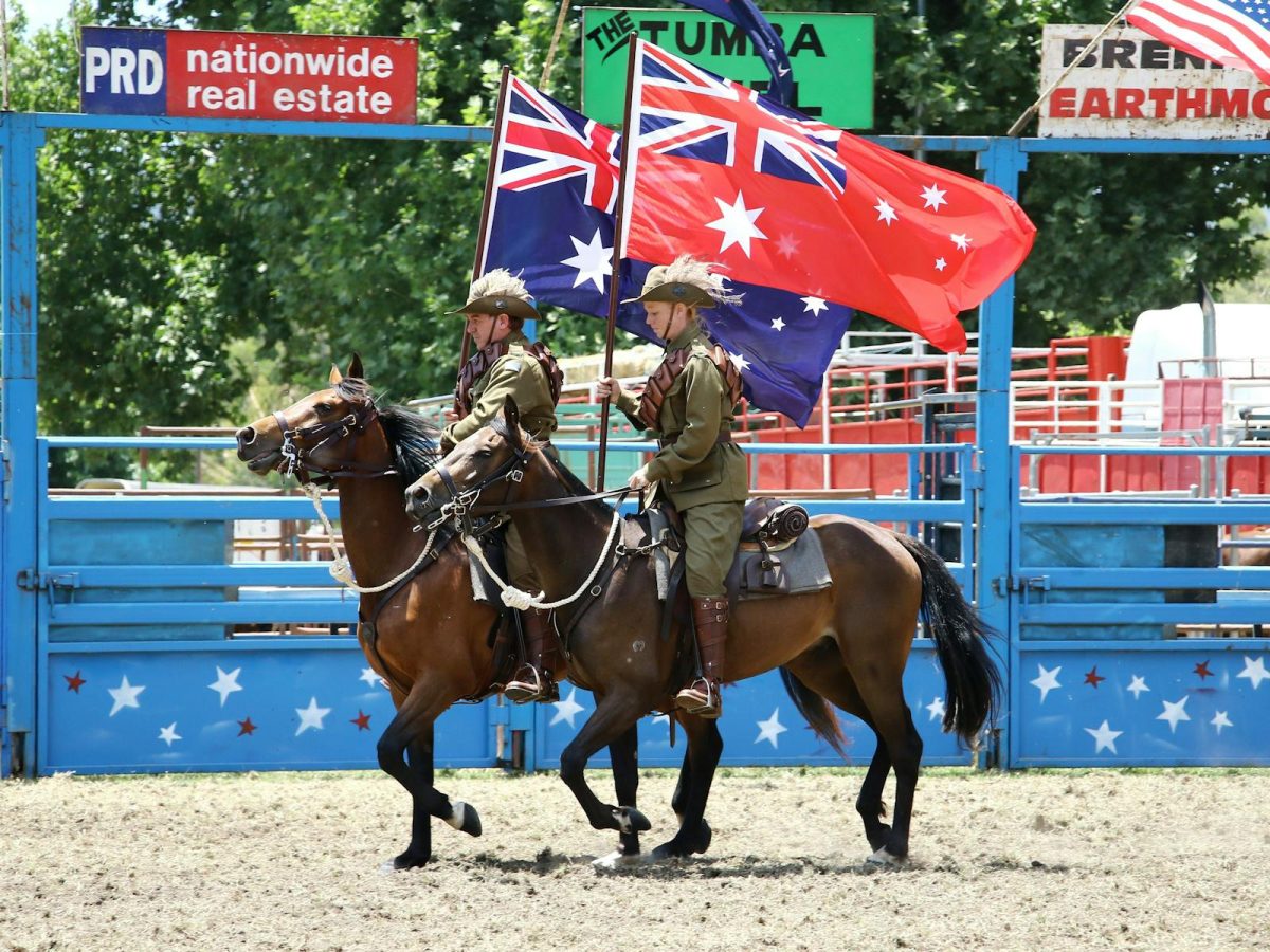 military horse riders with flags