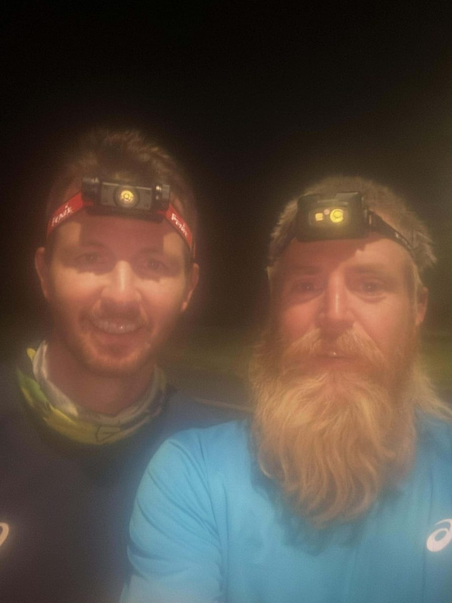 two guys with headlamps 