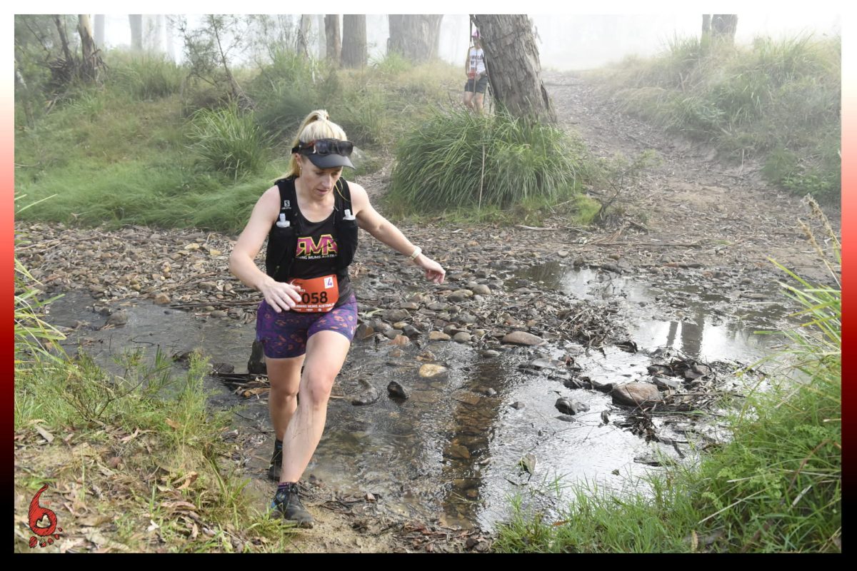 Julie running on creek
