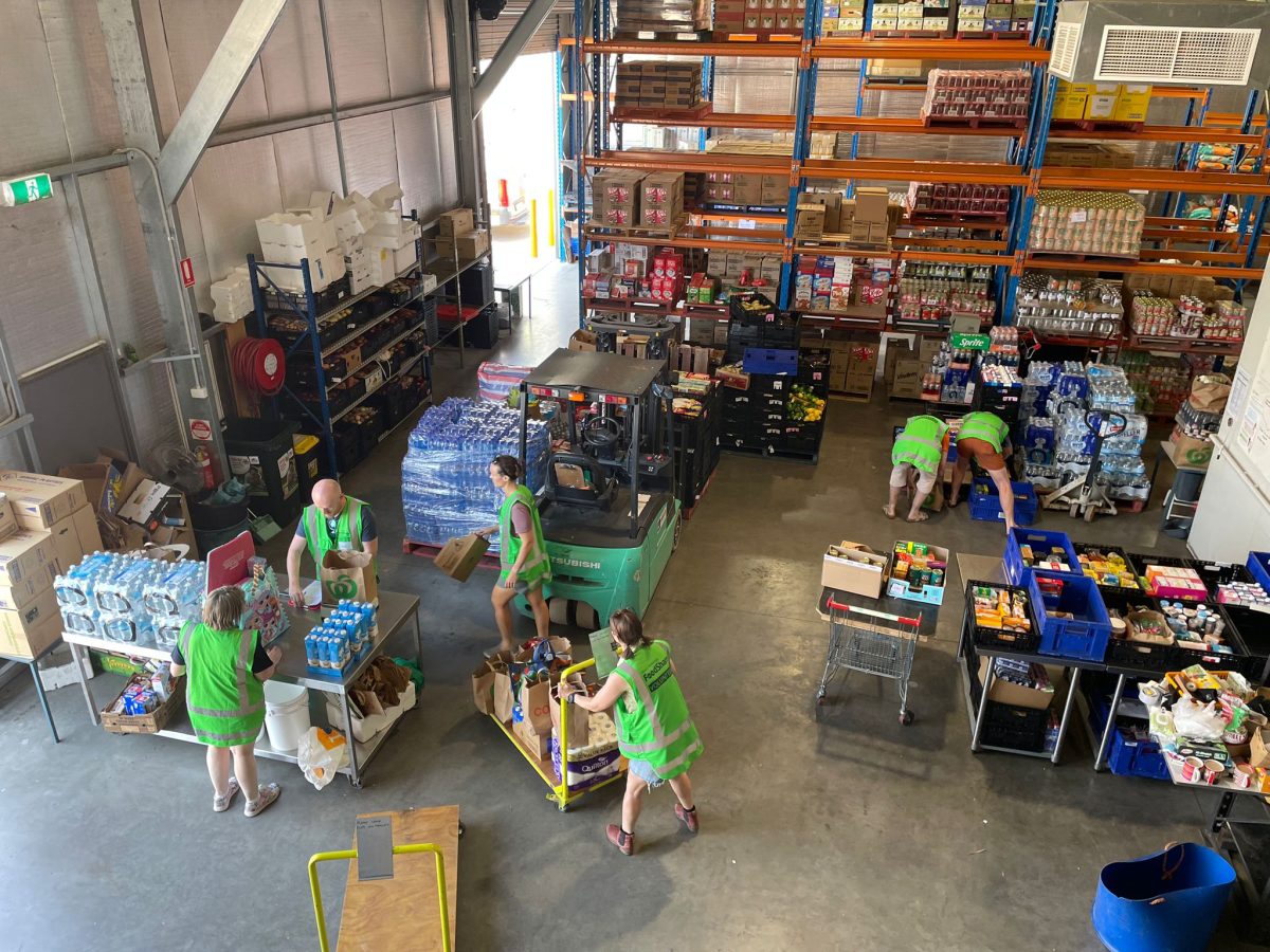 volunteers in a food warehouse