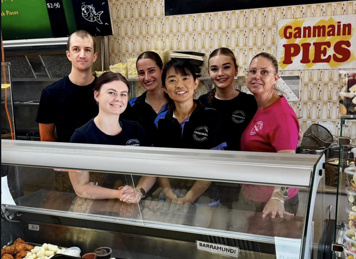 Shop team behind counter
