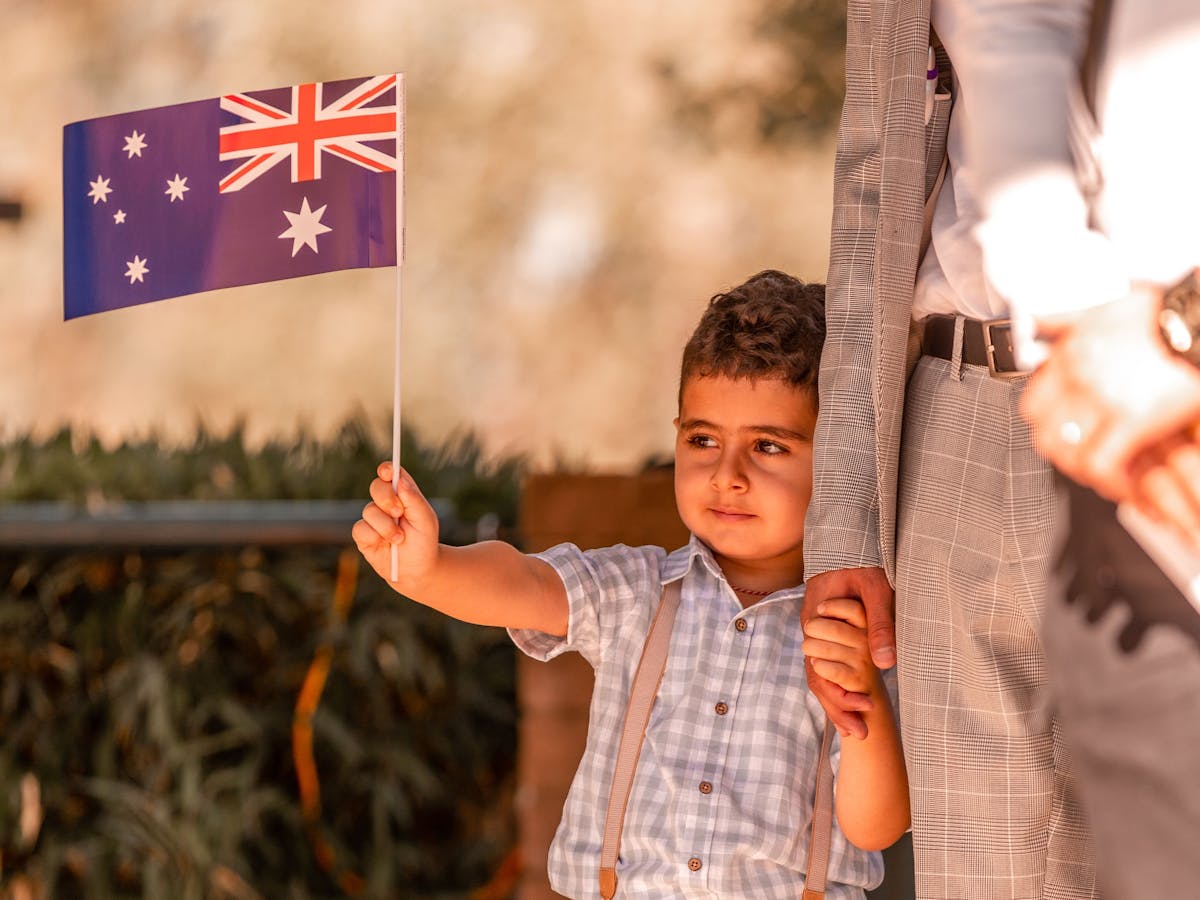 Boy waving an Australian flag