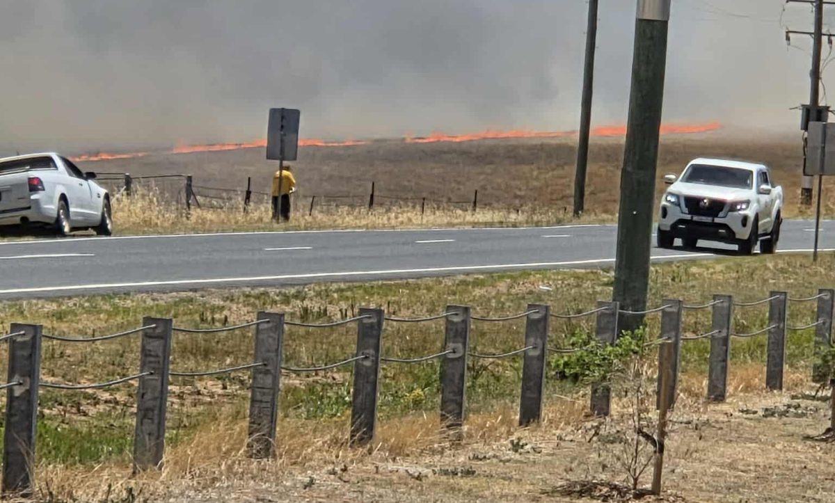 A fire near Gobbagombalin came within a few hundred metres of the suburb's residential area but has since been contained.