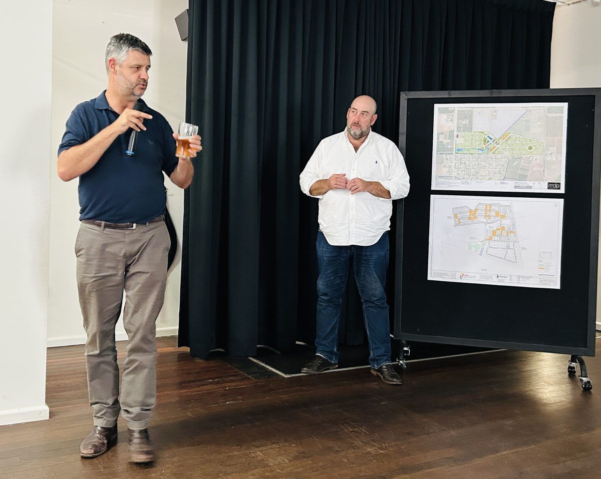 Guy with beer and microphone 