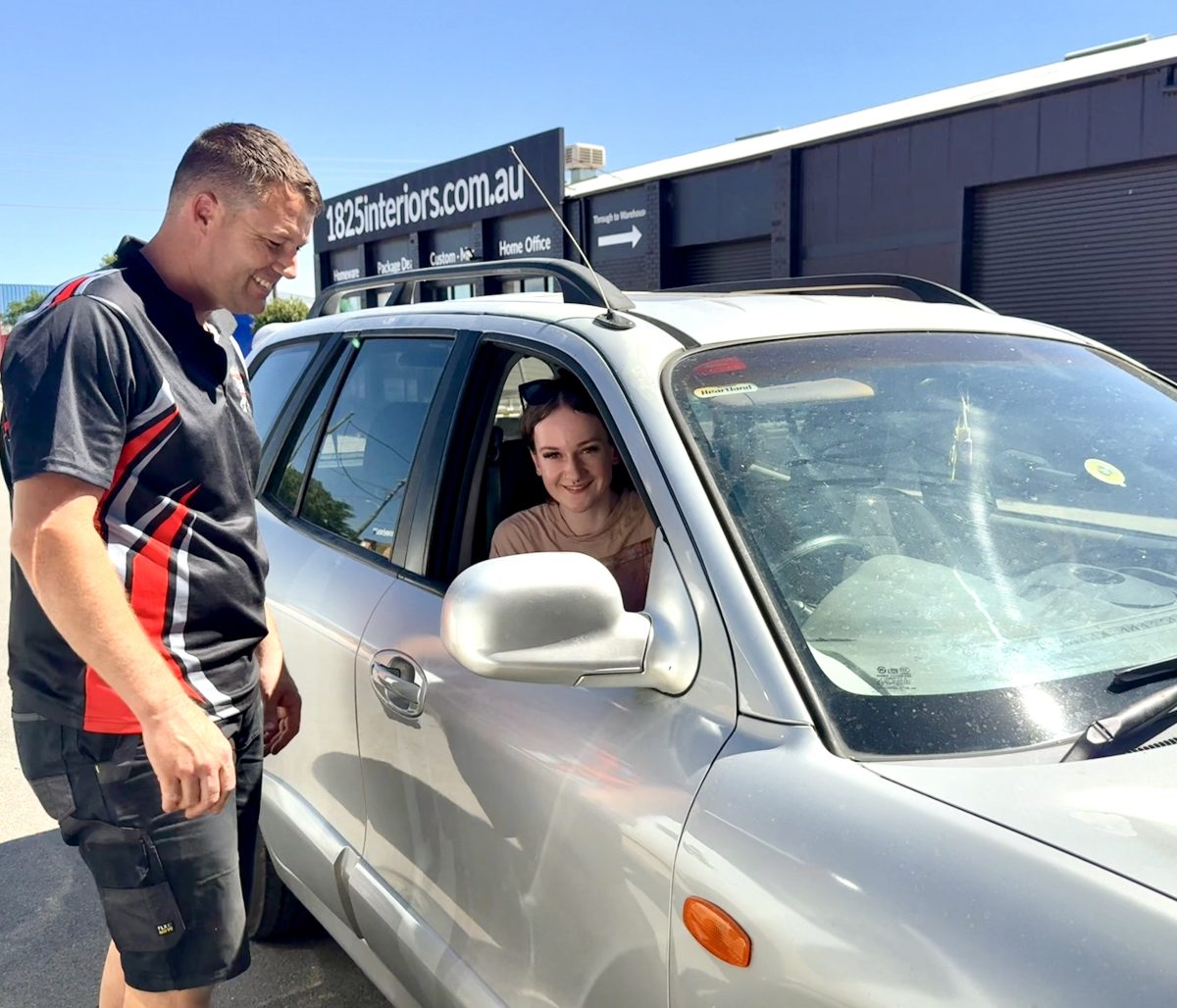 Zac Johnson with customer Jada Fletcher on opening day.